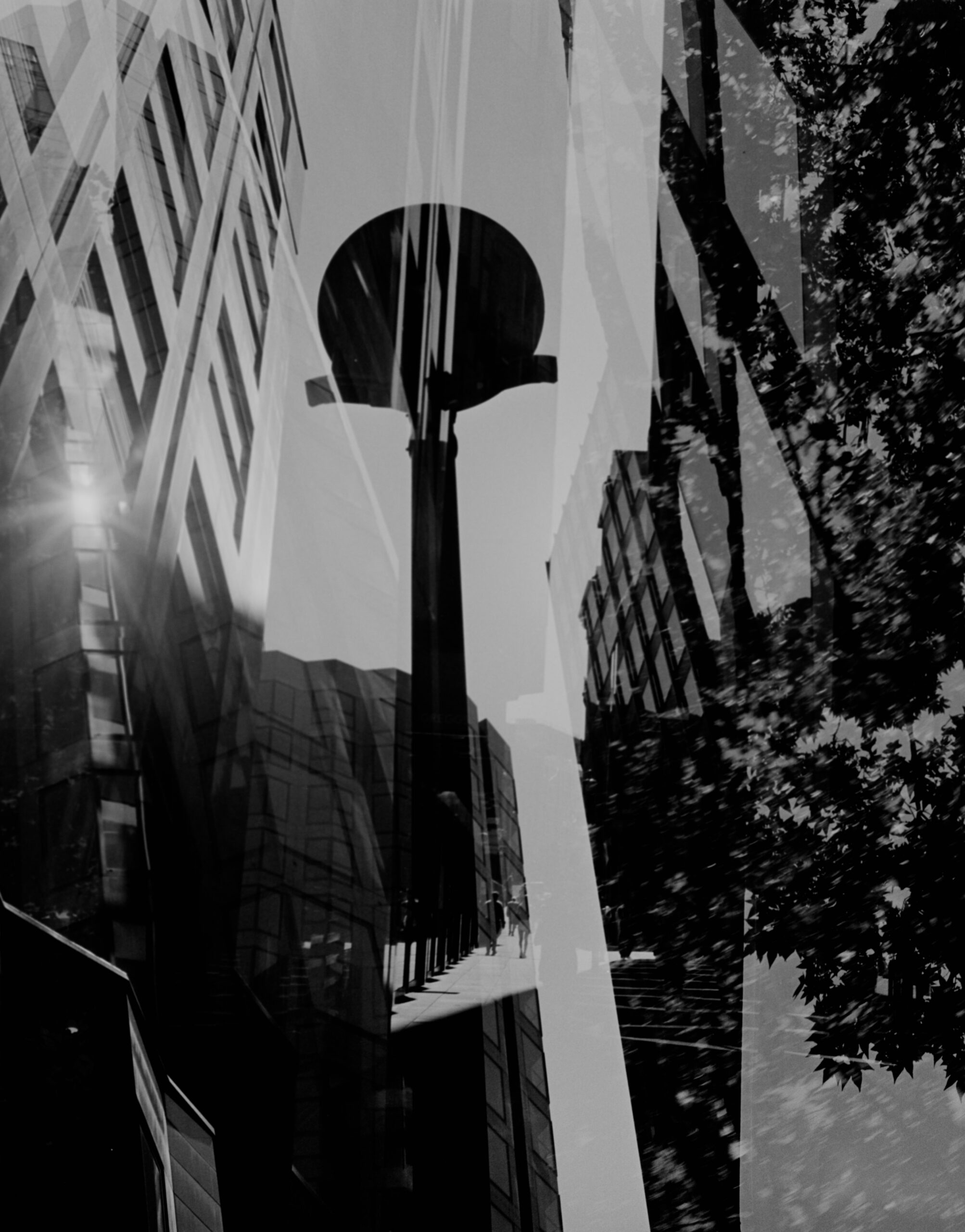 Monochrome cityscape with circular traffic sign and layered architecture